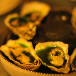Grilled oysters, pine, parsley / Acme (New York, 2014)